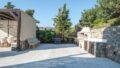 Zum Verkauf auf Kreta: Traumhafte Luxus-Villa mit sieben Zimmern direkt am Meer. atemberaubender Meer- und Insel-Blick. Plaka, Elounda