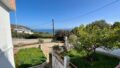 Kreta, Agios Nikolaos: Erdgeschoss-Wohnung mit Garten und Meerblick zu verkaufen