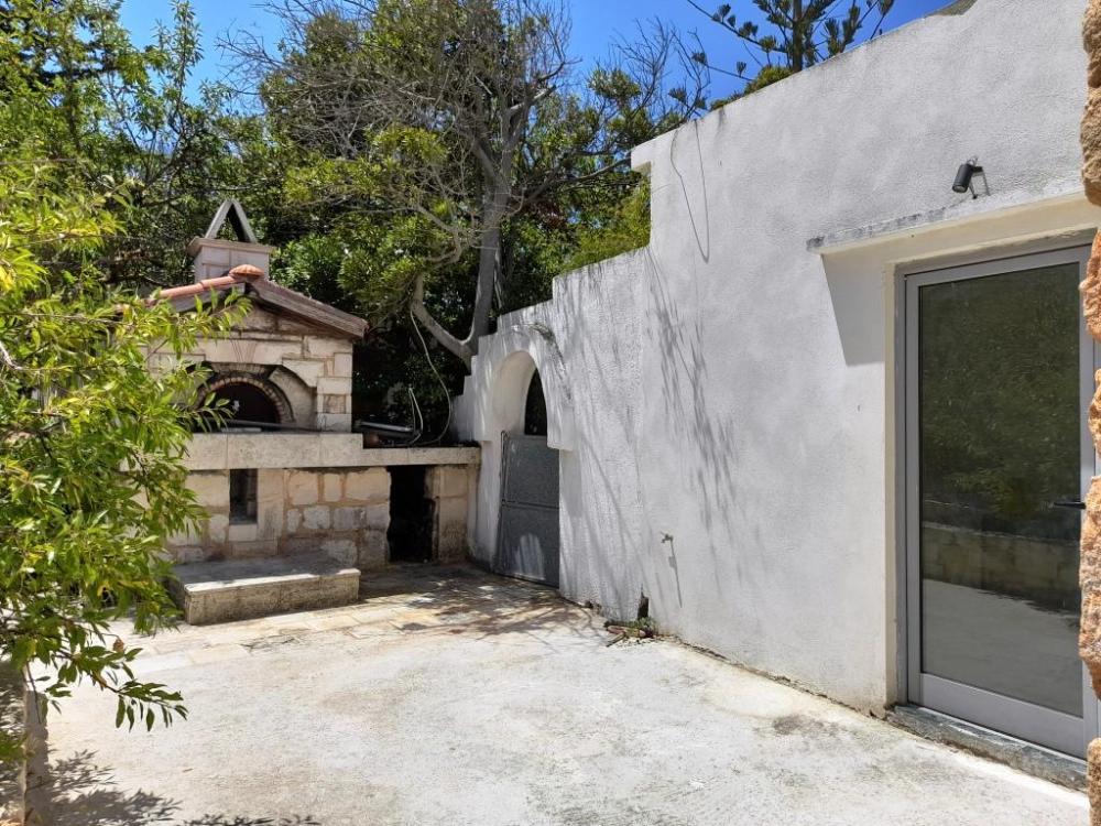 Kreta, Sikia: Drei Häuser auf einem Grundstück mit Meerblick zu verkaufen