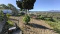 Kreta, Gonia: Zweistöckiges Haus mit Restbaurechten und Garten zu verkaufen