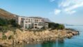 Kreta, Kissamos: Elegante Wohnung am Meer mit unverbautem Blick auf die Ägäis zu verkaufen