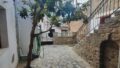 Kreta, Kavousi: Traditionelles Dorfsteinhaus mit Gästehaus zu verkaufen