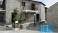 Südkreta, Agia Paraskevi: Zweistöckiges traditionelles Steinhaus zu verkaufen