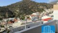 Kreta, Agia Galini: Haus zum Verkauf im Zentrum eines Küstendorfes mit separatem Gästezimmer