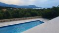 Kreta, Kokkino Chorio: Exquisite Villa mit Meerblick und üppigen Gärten zu verkaufen