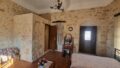 Kreta, Agios Myronas: Einfamilienhaus aus Stein zu verkaufen